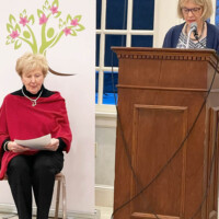 Marilyn Hanley (L) and Pat Towle kick off the evening's program